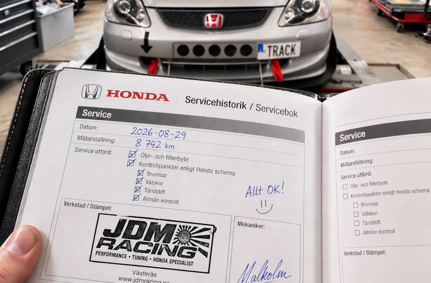 Servicebok med JDM Racings stämpel efter utförd Honda-service